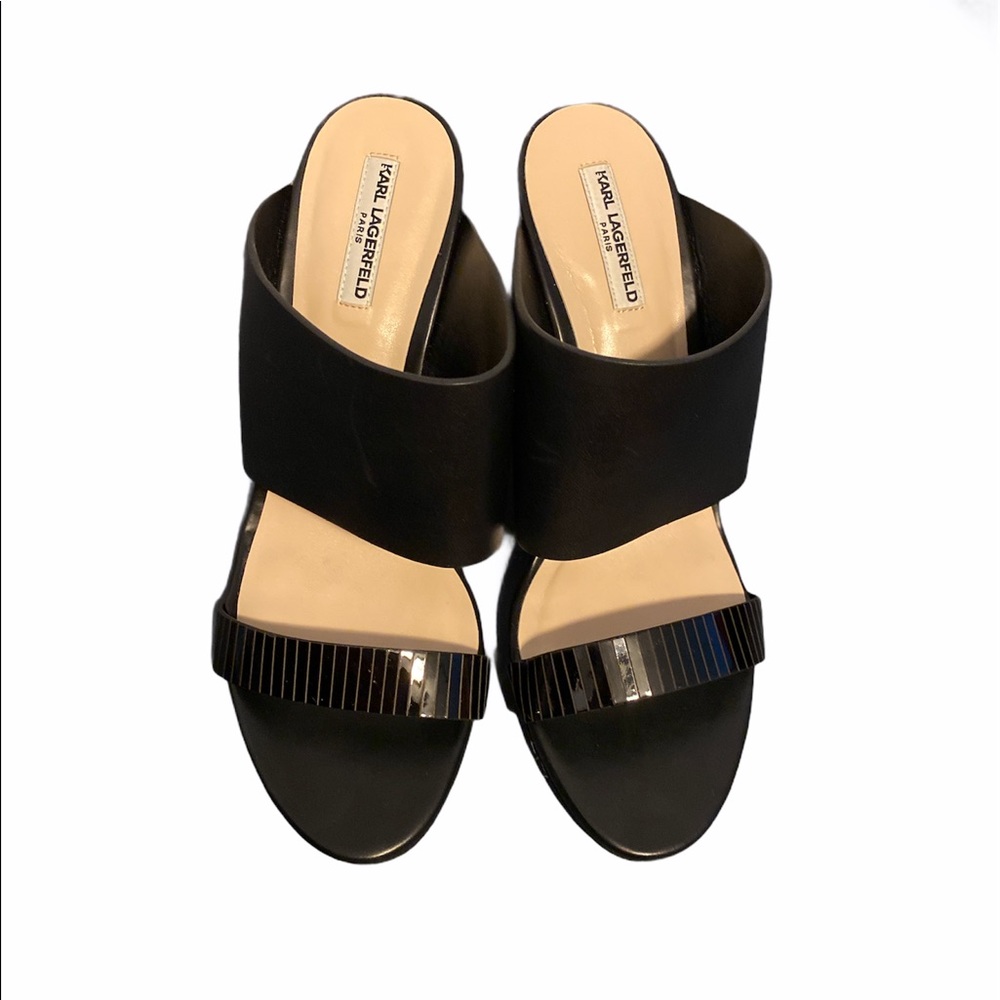 Woman’s black wedge heels